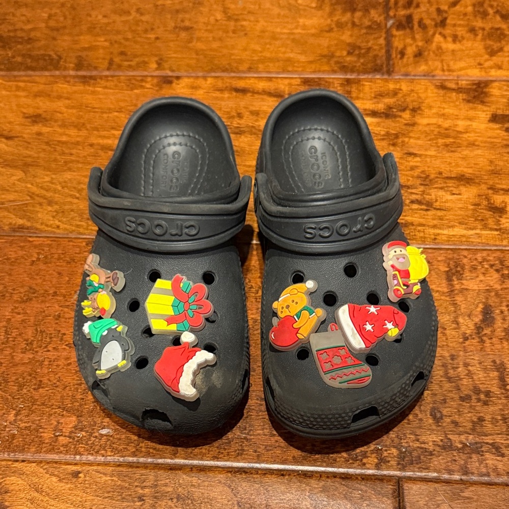 CROCS Kids Black Moccasins with Festive Charms